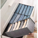 Caixa de armazenamento com grades para roupas