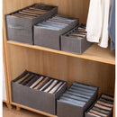 Caixa de armazenamento com grades para roupas